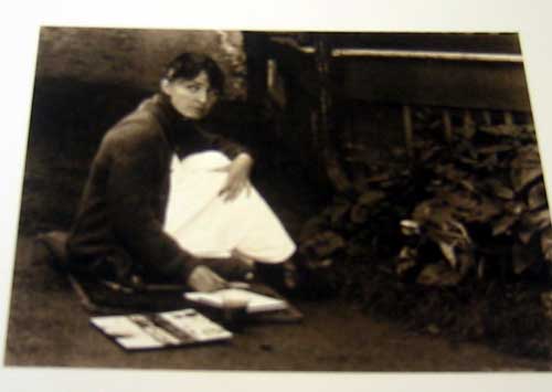 Georgia O'Keeffe working on her artwork